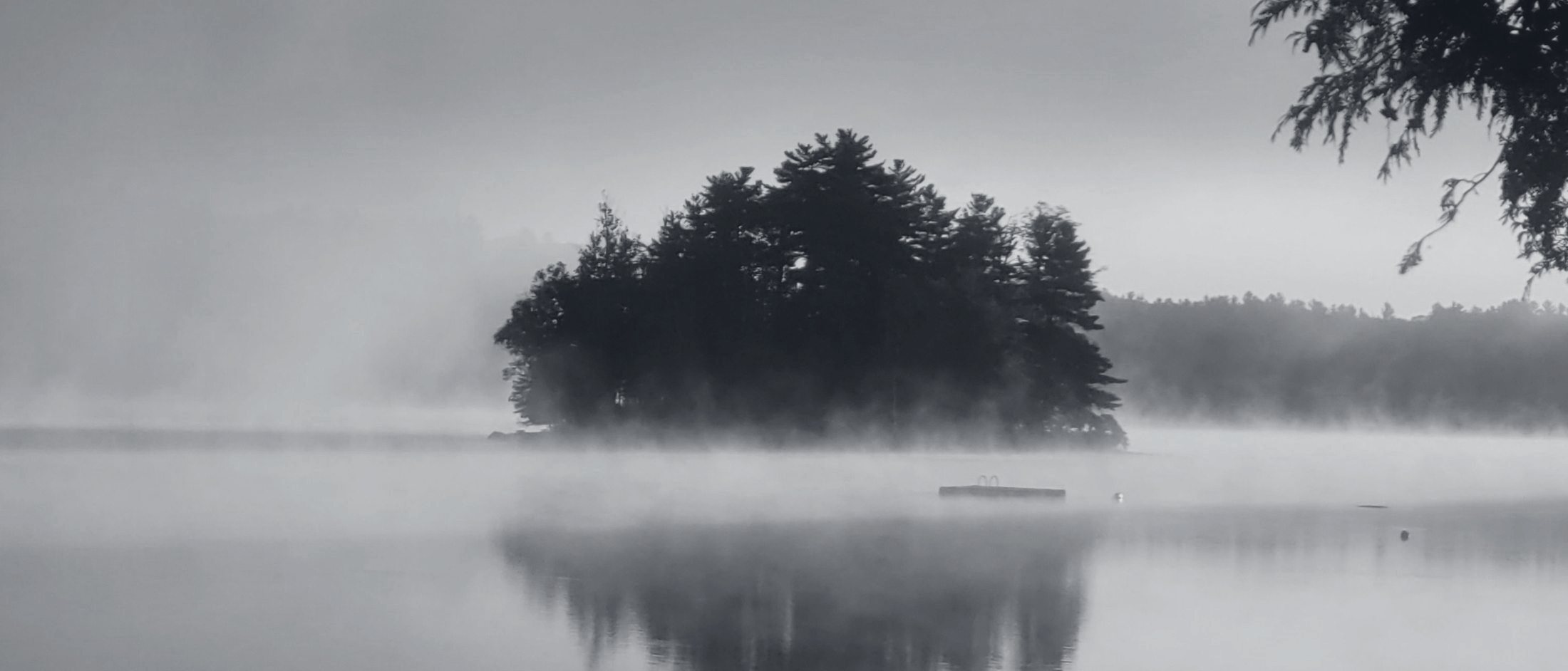 Outaouais lake in morning mist