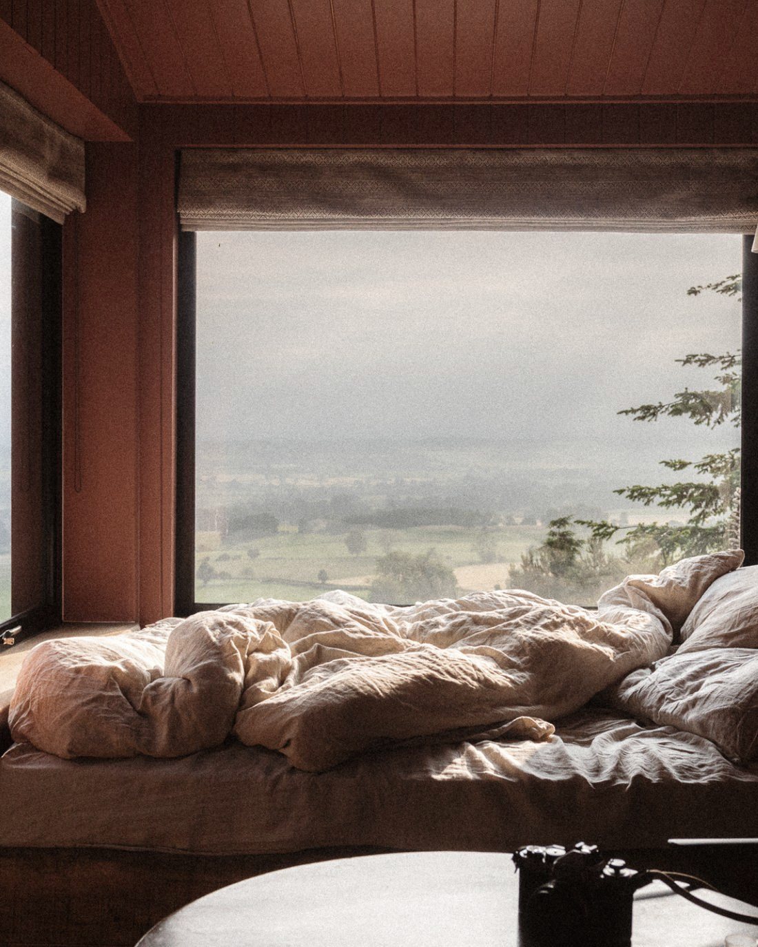 Cottage bedroom opening onto the valley